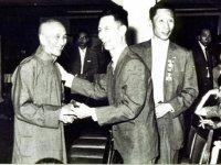 Ip Man (left), Chu Chong Mun of the Chi Sim Weng (center), Ip Bo Ching (right)