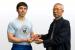 Chu Shong Tin presents Tristan Fung with his Level 3 badge in May 2008.